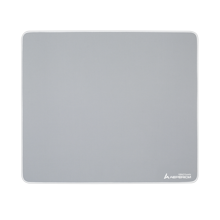 The Aeperion Quartz cloth pad, a plain mid-grey rectangle with a stitched white edge and the Aeperion wordmark in the lower corner.